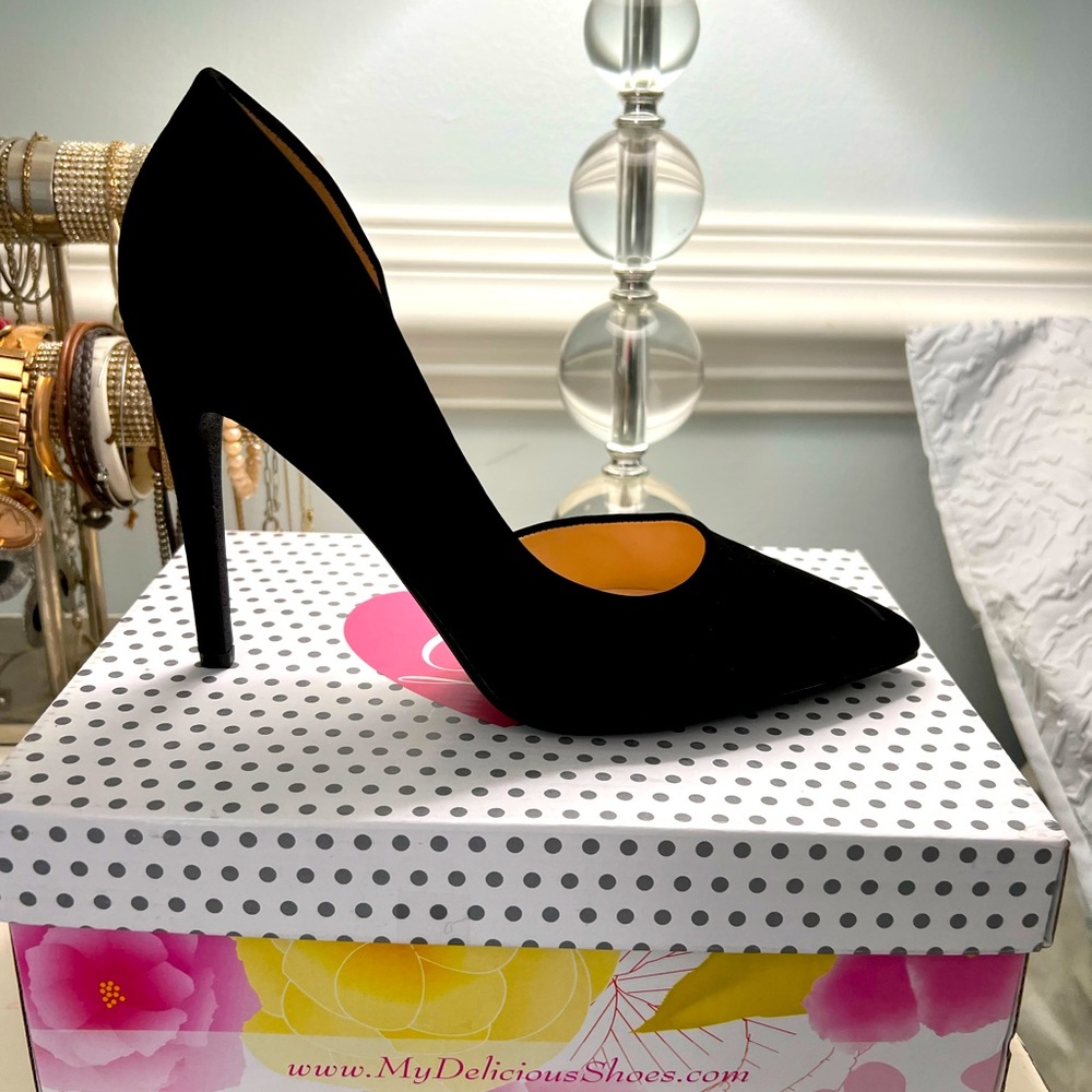 Black heels, never worn
